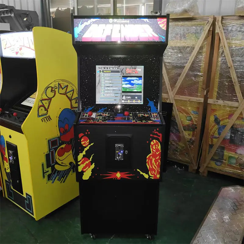 Front view of a Defender 2 Player Arcade Machine themed with Defender design. The Machine also features a marquee that says "Defender" in yellow text, 2 red joysticks, black buttons, and white buttons