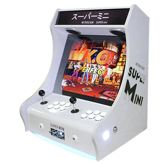 White 2 Player Tabletop Arcade Cabinet that features black text on the side that says "Super Mini", 2 black joysticks, and white buttons. The marquee is black and features white text in Chinese.